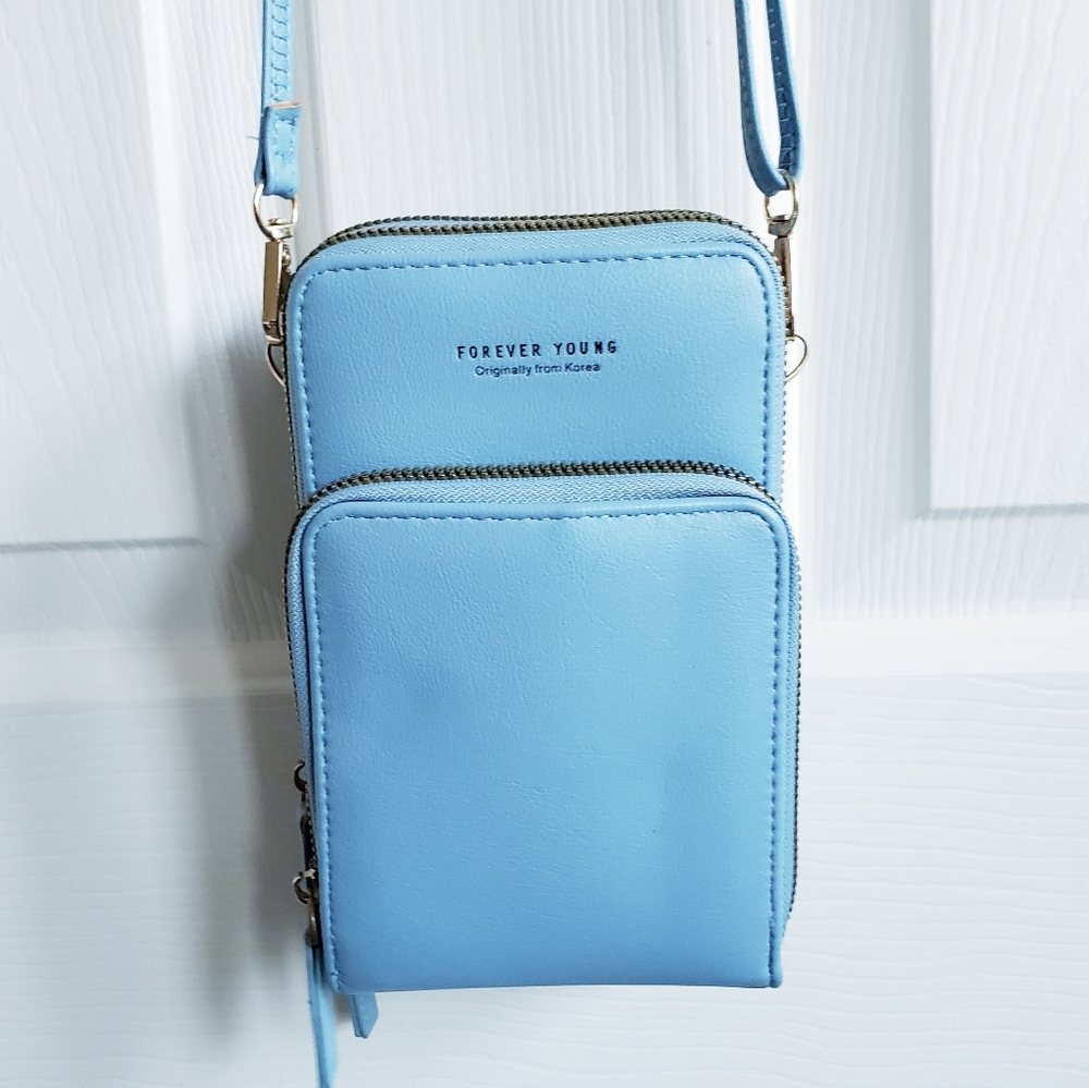 ❤Like New! Forever Young crossbody bag baby blue with gold zippers